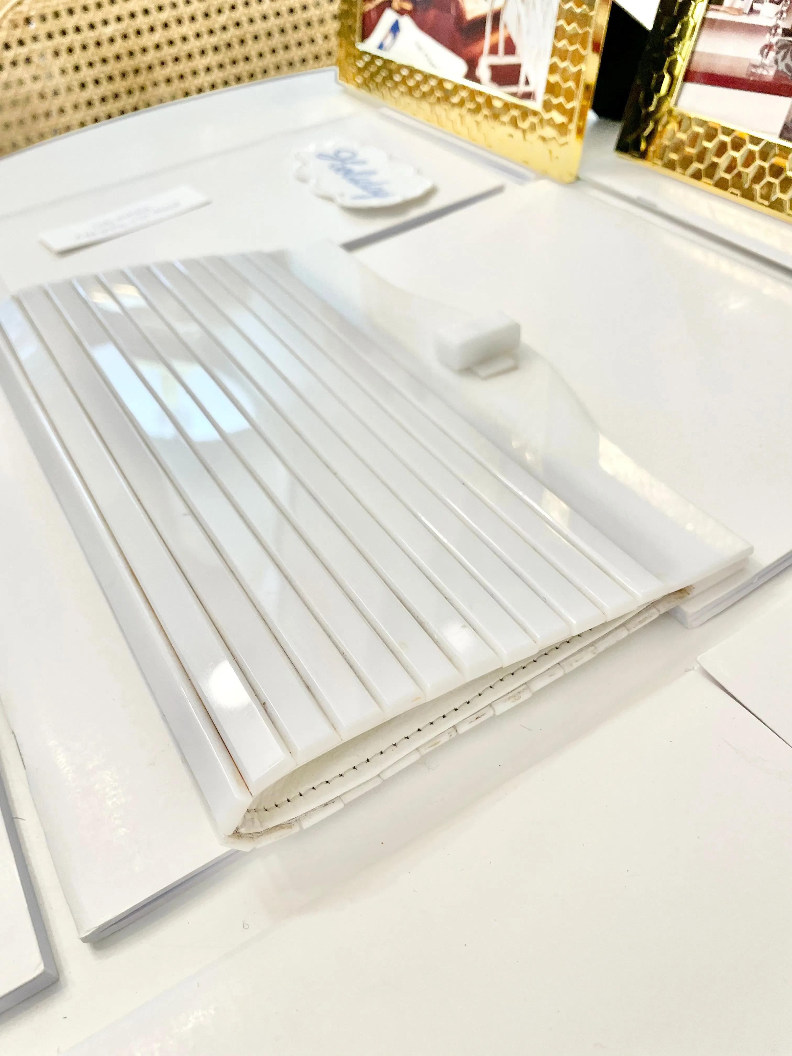 The most divine blanc plastic mod style clutch bag.... so feminine!