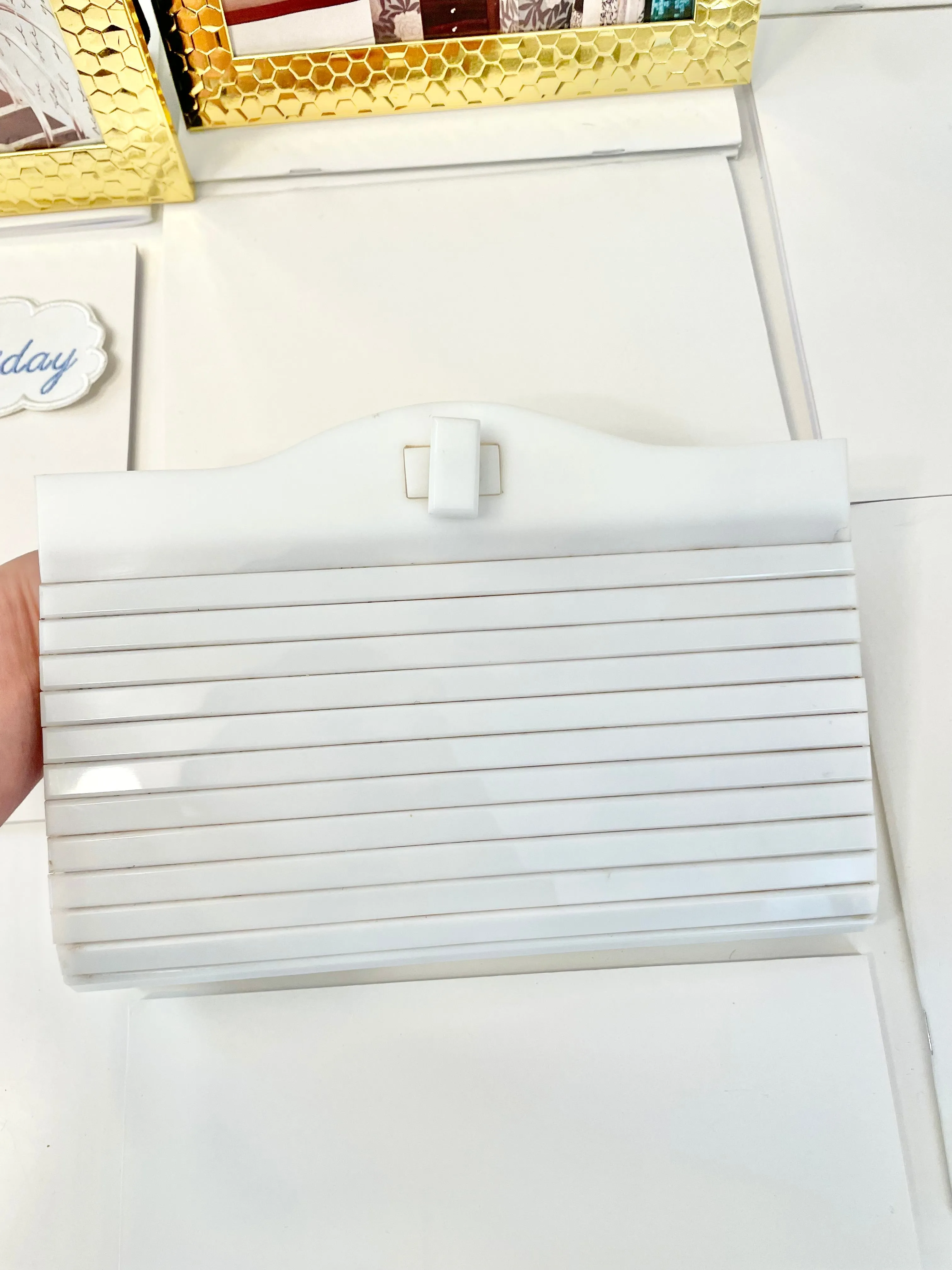 The most divine blanc plastic mod style clutch bag.... so feminine!