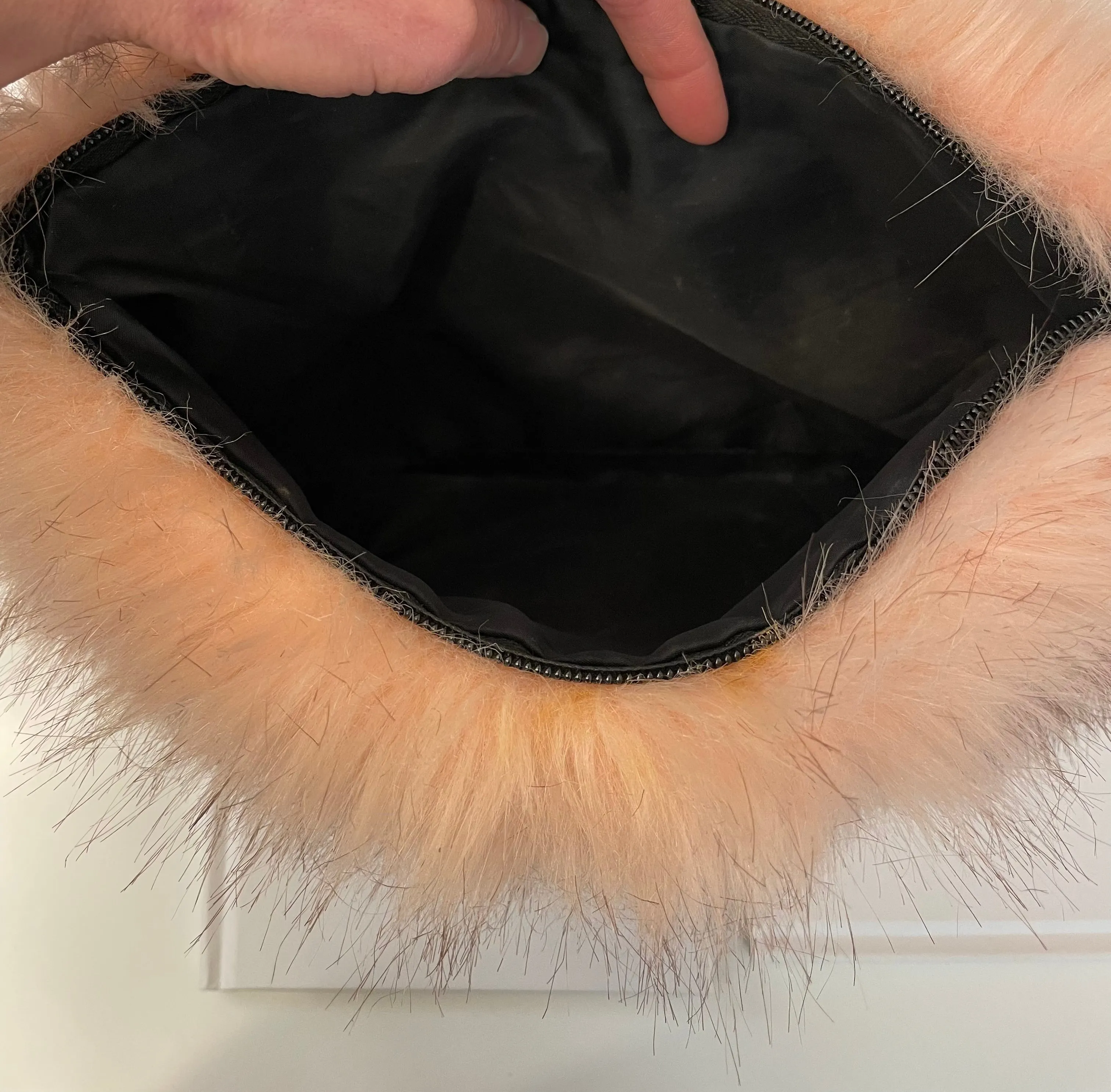 The most lovely blush faux fur clutch bag! So feminine...