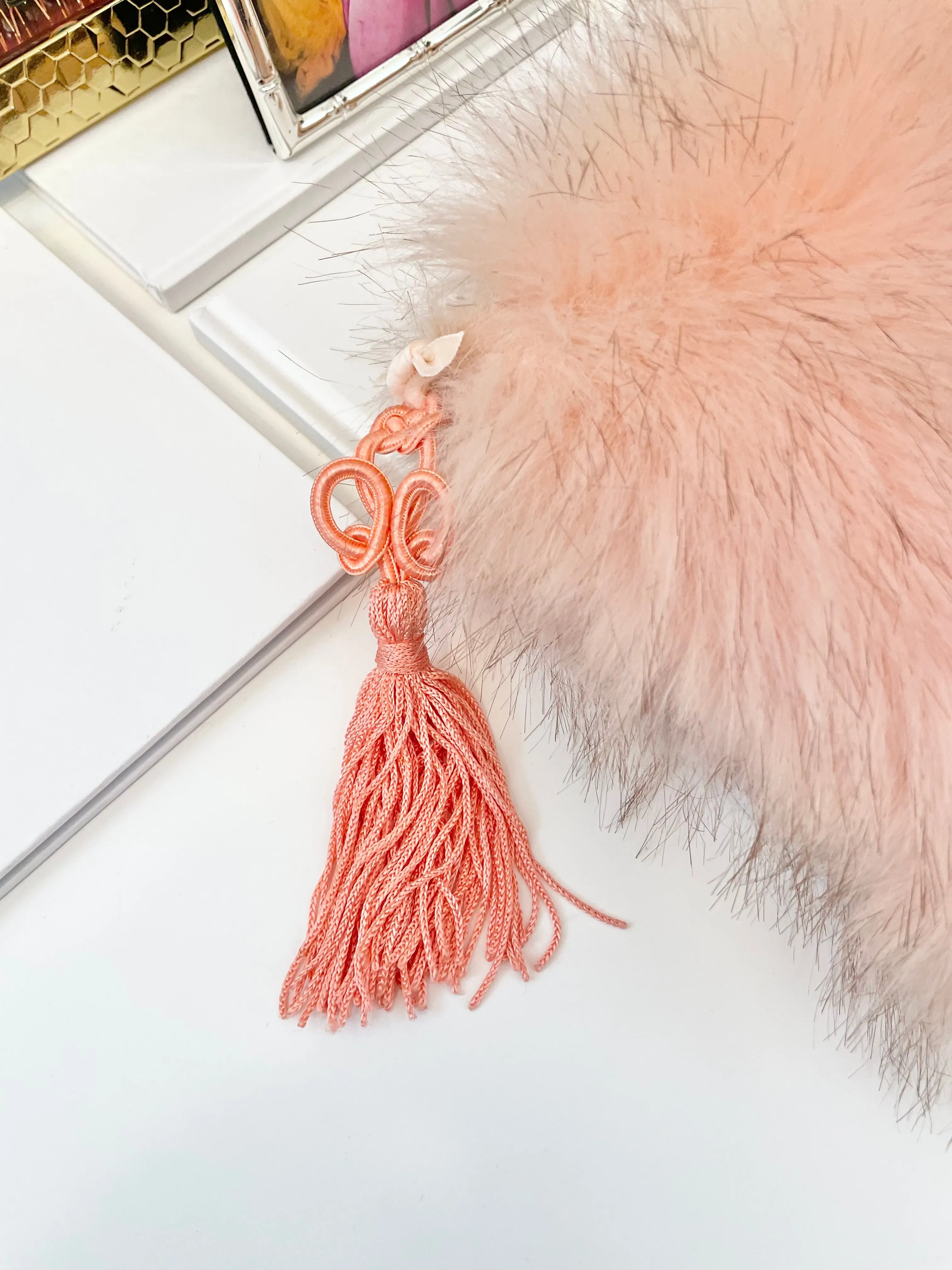 The most lovely blush faux fur clutch bag! So feminine...