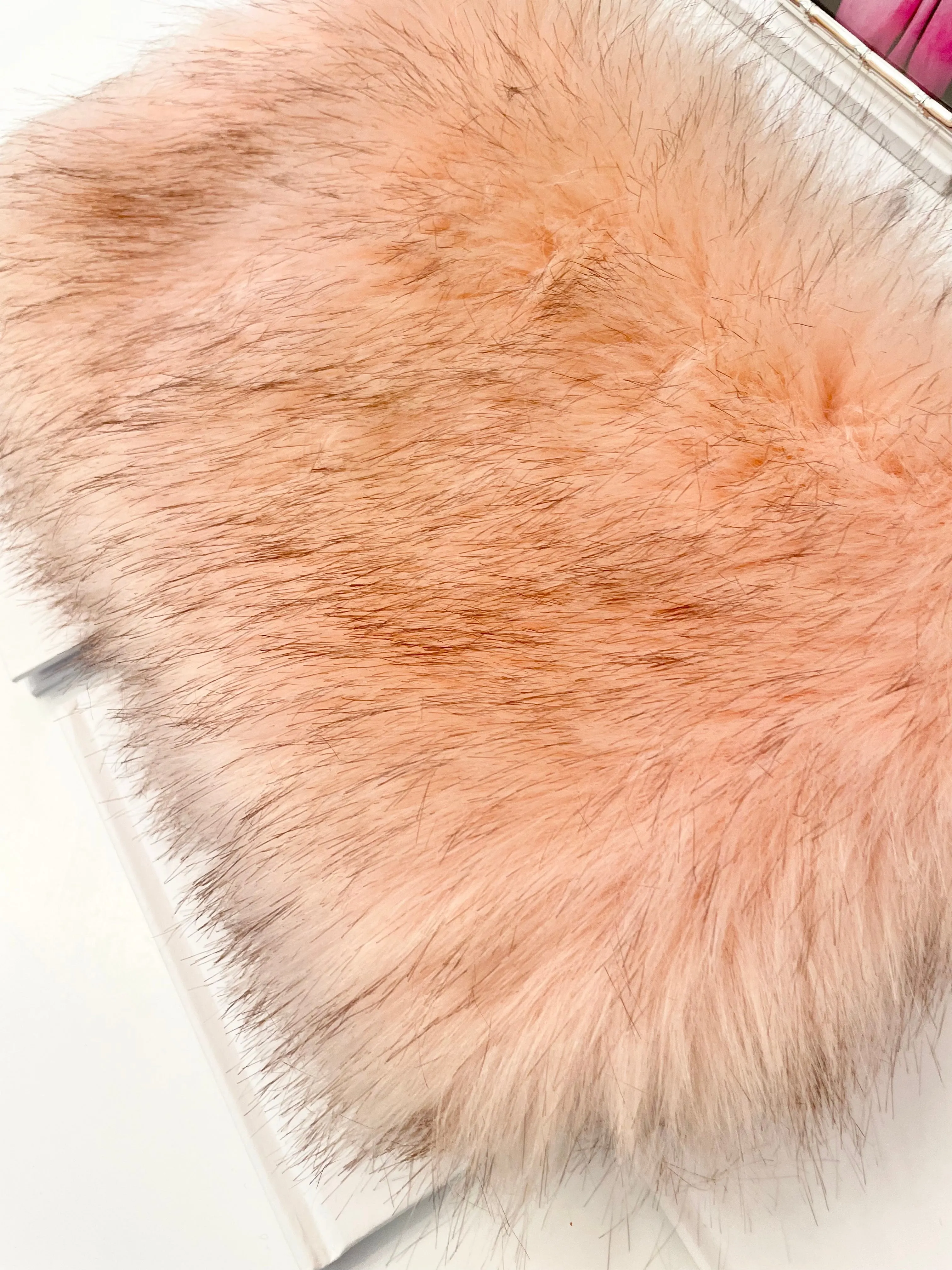 The most lovely blush faux fur clutch bag! So feminine...