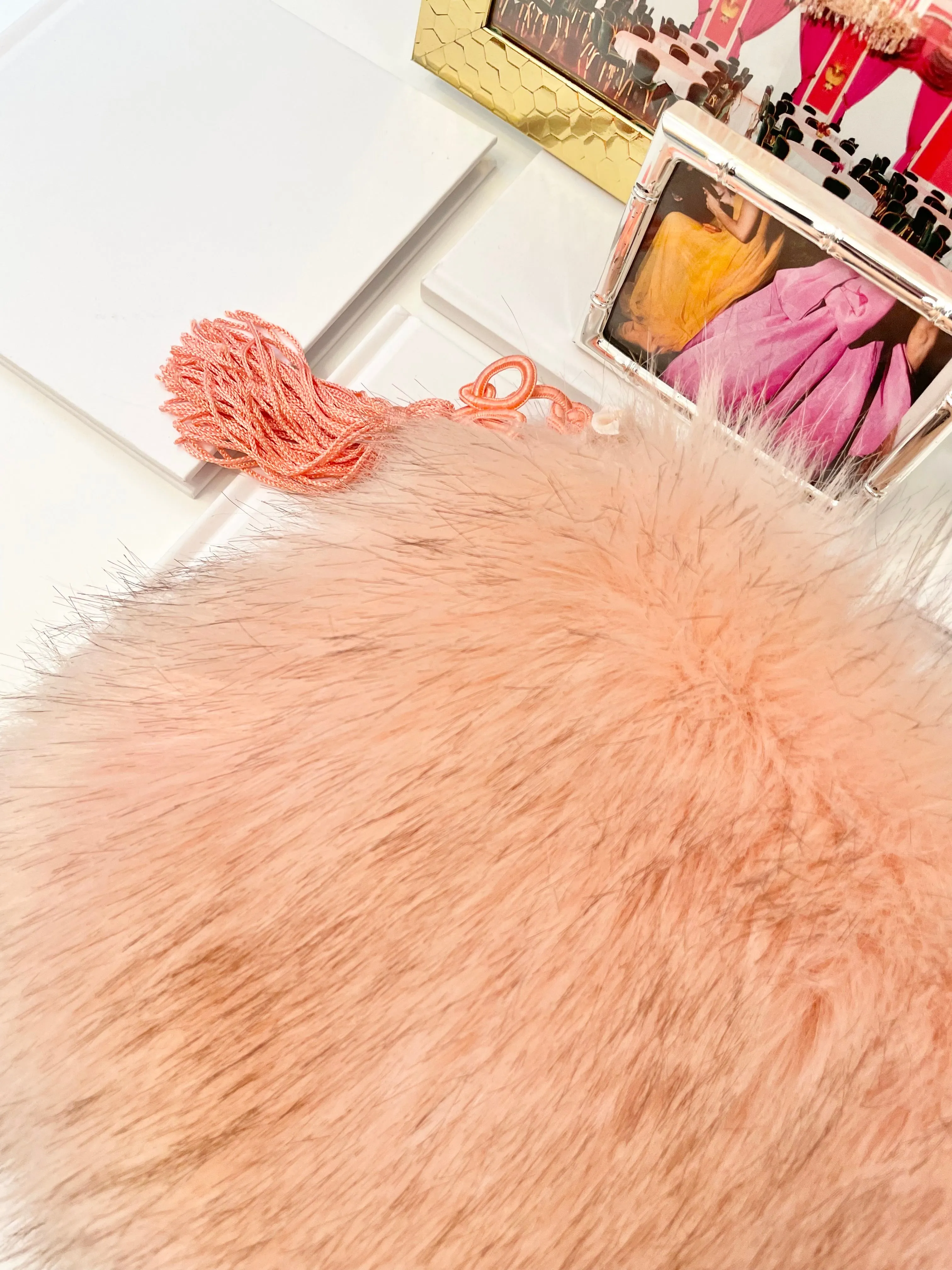 The most lovely blush faux fur clutch bag! So feminine...