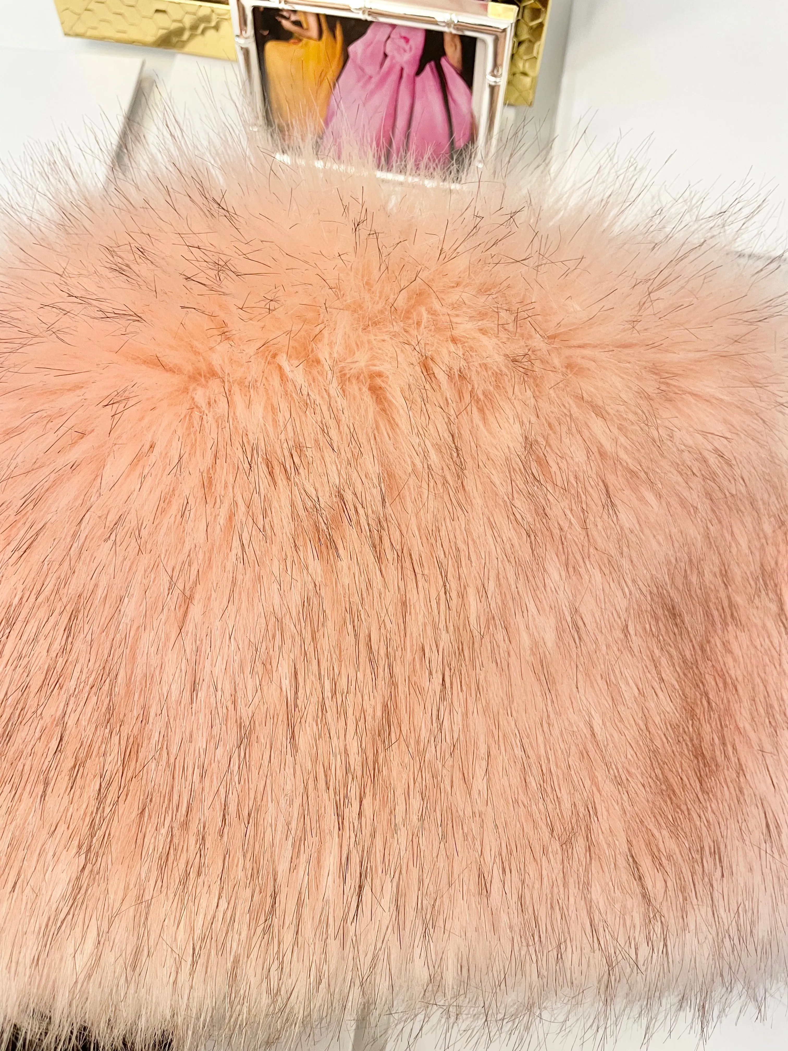 The most lovely blush faux fur clutch bag! So feminine...