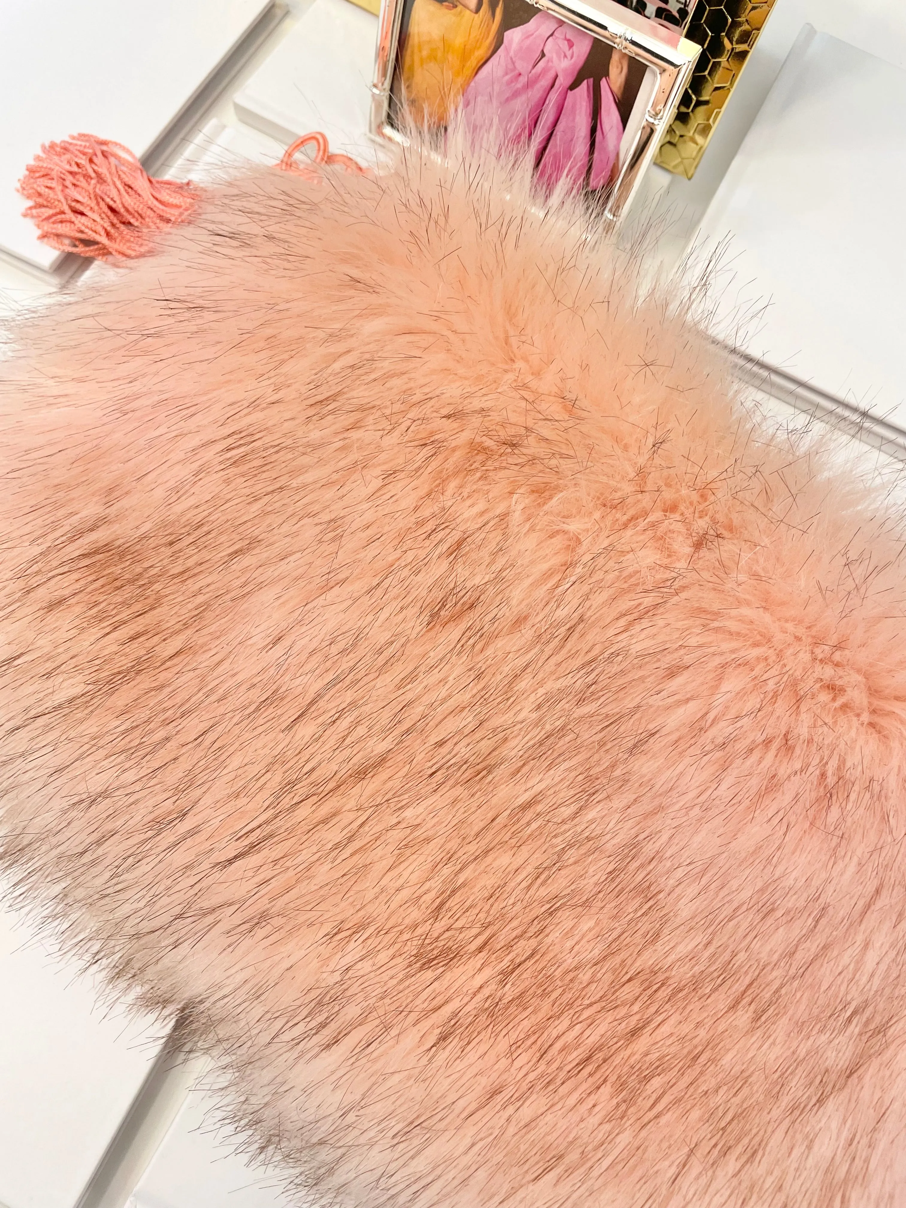 The most lovely blush faux fur clutch bag! So feminine...