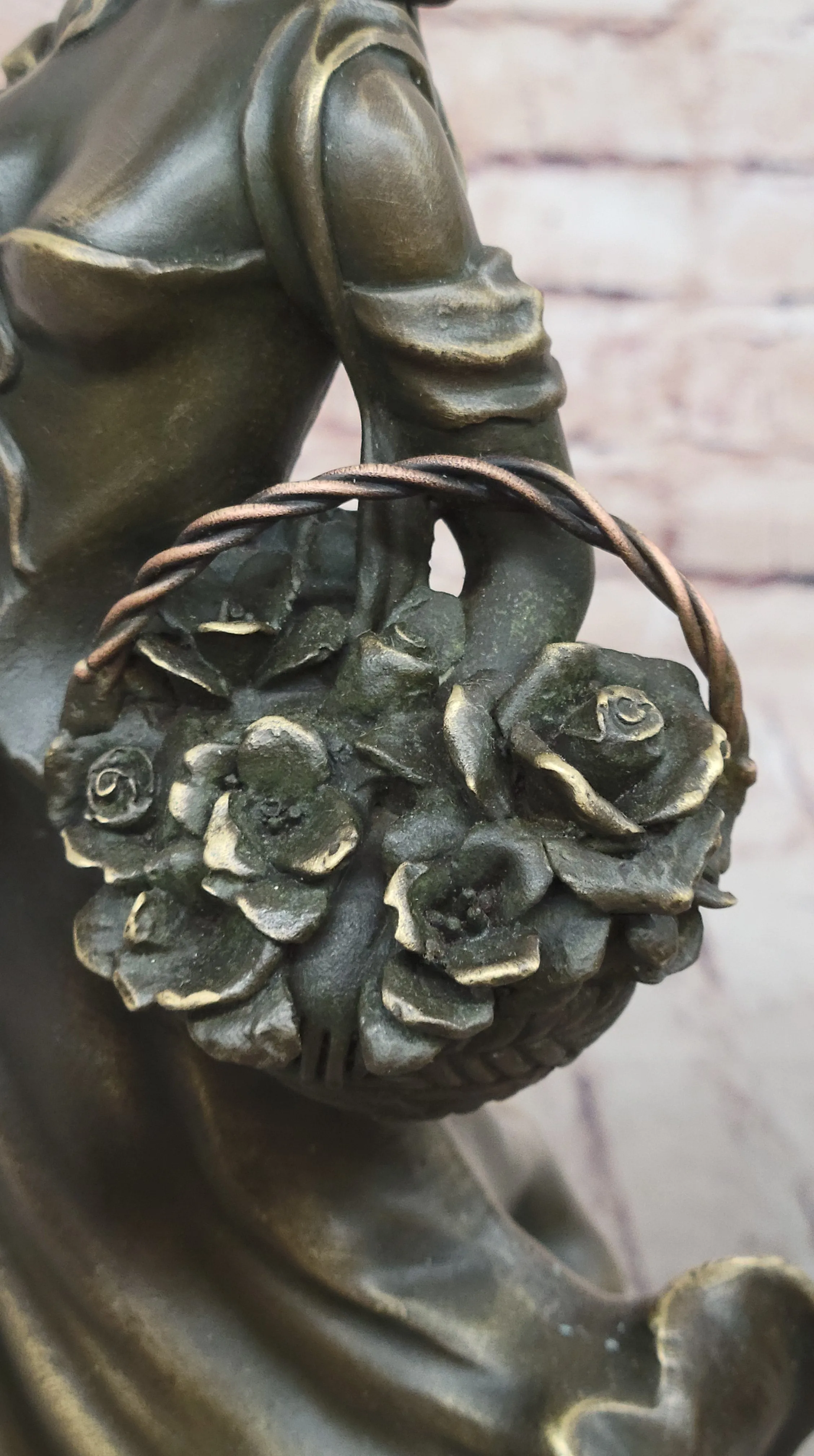 Young Woman Carrying Basket of Flowers - Bronze Metal Sculpture by Milo