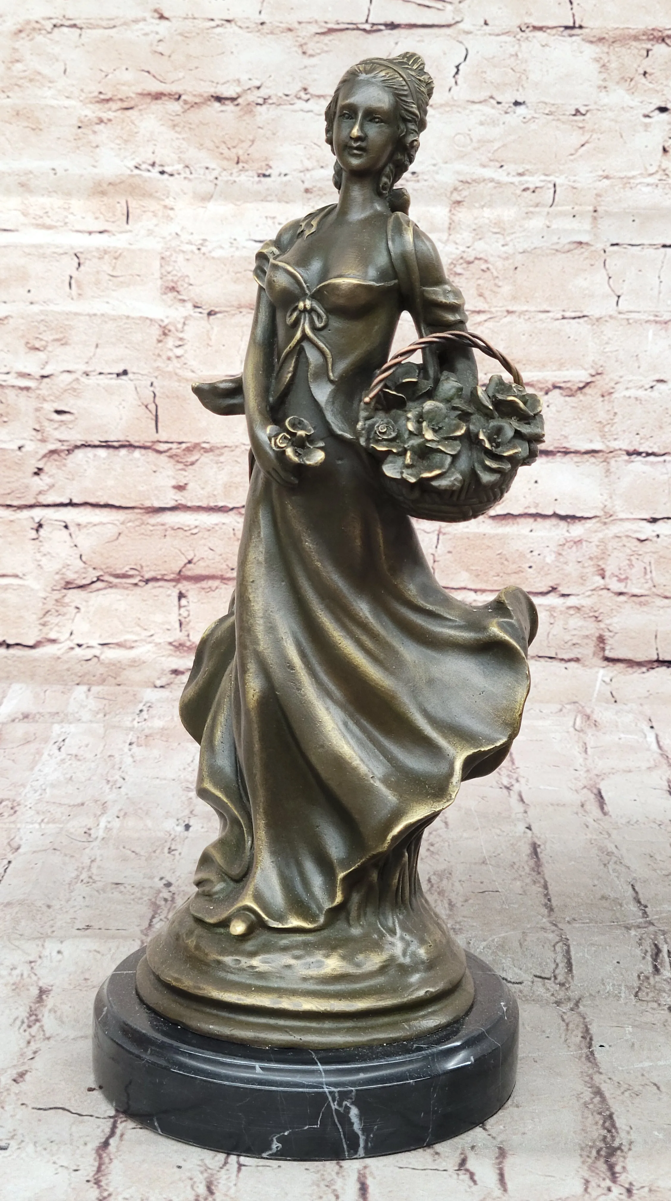 Young Woman Carrying Basket of Flowers - Bronze Metal Sculpture by Milo