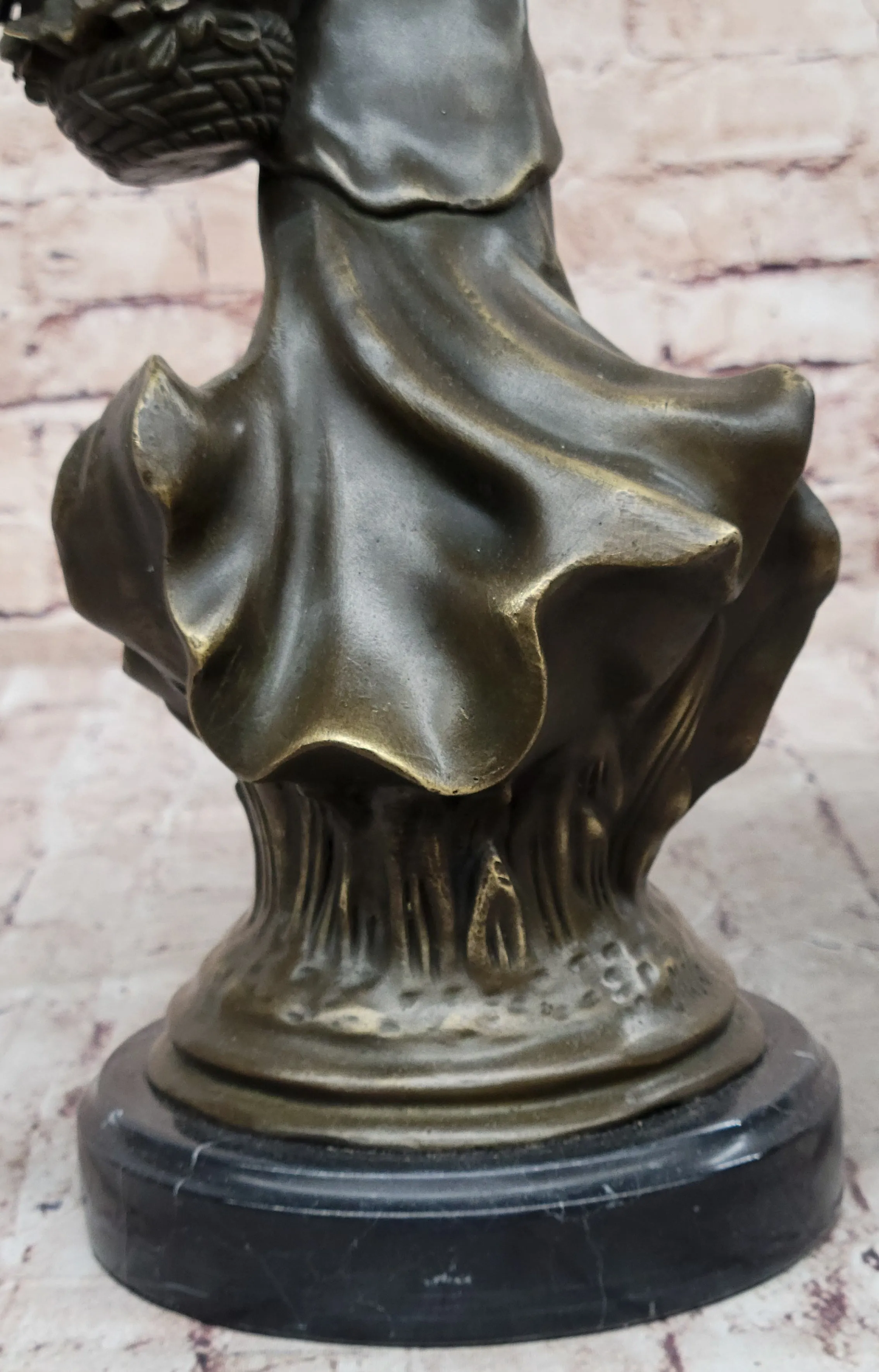 Young Woman Carrying Basket of Flowers - Bronze Metal Sculpture by Milo